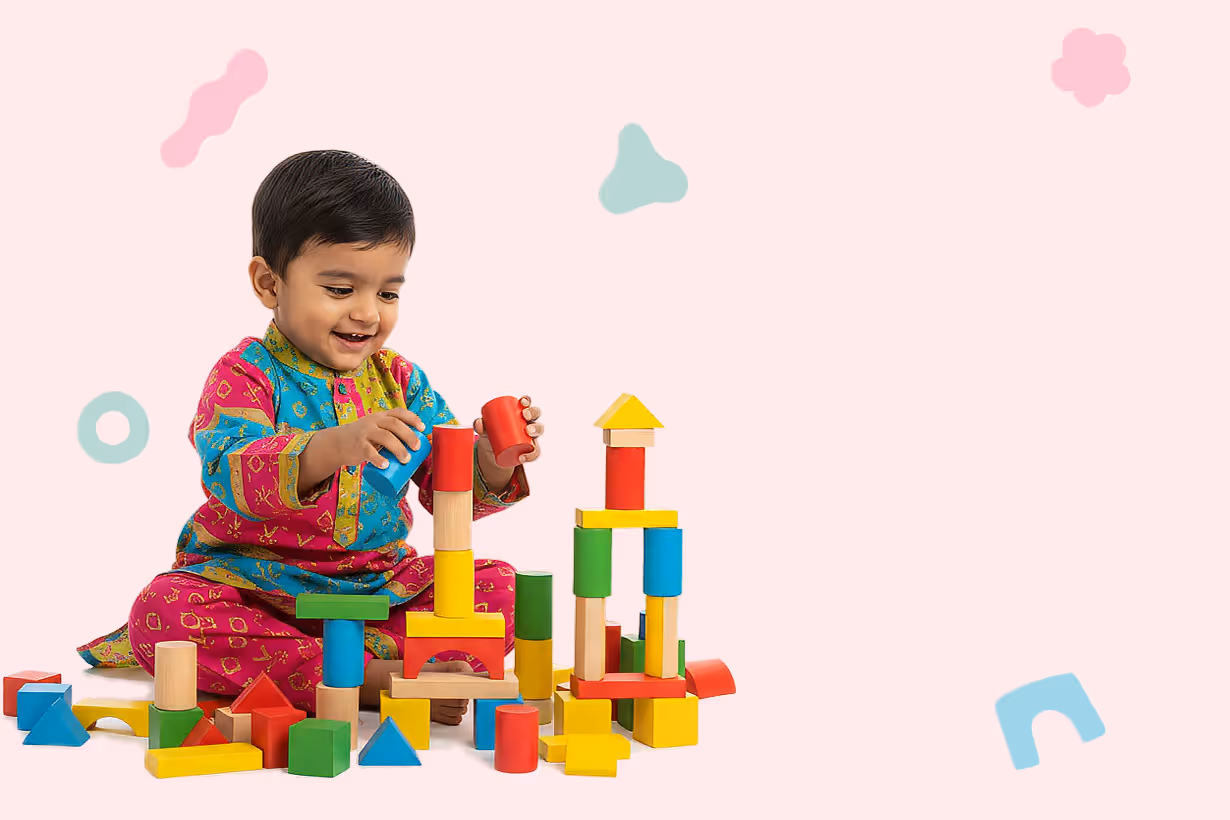 Smiling child in colorful traditional dress playing with multicolored wooden building blocks.